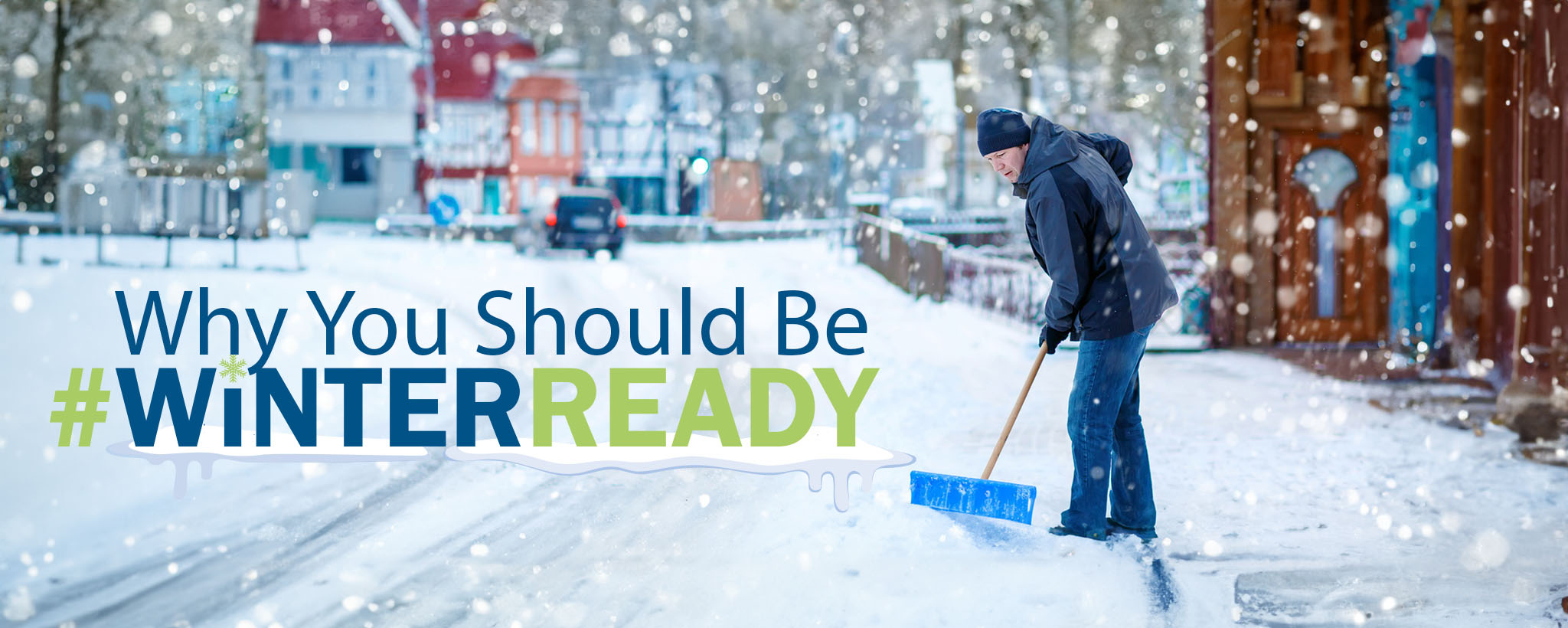 Man shoveling snow. Why you should be #WinterReady